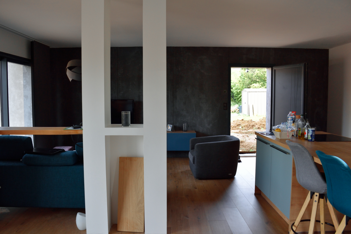 livingroom plus kitchen in a design house in Occitanie